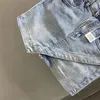 Spódnice Nieregularna, krótka spódnica z wysokim pasażem dla kobiet antylśnieniowych lato 2024 A-line Slim Wrap Hip
