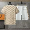 Zestaw projektantów Mężczyzn T-sens Męskie T-shirt Dwuczęściowy marka Man Man Krótki garnitura Jogging Sportswear Logo Tshirt Krótkie spodnie 2PCS 29 kwietnia