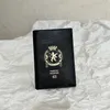 Passeport de passeport pour hommes en noir support de carte de conception de concepteur Case de protection des passeports long portefeuille 1 billet dans le portefeuille noir pièce