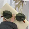 Frauen Oval Designer Sonnenbrille Männer Retro kleiner runder Rahmen Grüne Objektiv Sonnenbrille Metall Rahmen sexy kleine Sonnenbrillen fahren Strand Sonnenschatten fahren