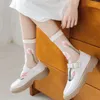 Chaussettes de femmes cristal soie la mode féminine harajuku rond cou rot-flore street street porte élastique mignon sock kawaii