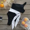 Kvinnors badkläder bröstkudde utan stålstöd färg som blockerar enskild axel sexig rand Jumpsuit hårvax borttagning för kvinnor bikini