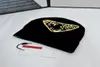 Erkek Beanie Kadınlar Örme Şapatası Kafatası Kapakları Tasarımcı Tiger Jacquard Kış Sıcak Yün Şapkalar Klasik Yüksek Sokak Çifti Açık Moda 4367388