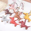 Keychains Lanyards Classic and Cute Dog Bag Pendant Keychain Fashion PU Leather Sausage Keyring Accessories Q2404301