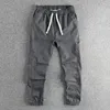 Pantaloni da uomo 2024 abbigliamento minimalista per uomini leggings giovanili primaverili/estivi casual 107
