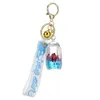 Keychains lanyards meisjes hartvormige acryl drijvende sleutelhanger oceaan poppen deksel en sleutelhanger hangerolie vloeistof hanger Keychain Q240429