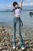 Jeans da donna Summer High Elastic Flare pantaloni con bordi in pile e micro vita per una ragazza piccante sottile che appare