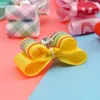 Coiffe de vêtements pour chiens Bows Cat Coups faits à la main avec un élastique Produits de chiot de chiot accessoires petits chiens