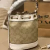 Сумки Olay Classic Logo Dempsey 15 Bucket Bag Mini Один плеч