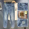 Heren jeans ontwerper Hong Kong trendy merk jeans voor high-end Koreaanse elastische slanke, modieuze en veelzijdige casual lange broek 2p18