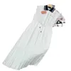 Vestidos casuales básicos Marca de diseñador M24 Summer Nuevo serie de estilo Academy Carta bordada Contrast Polo Collar Sleeveless PLISADO Camisa de cintura alta Gyux