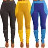 Pantalon féminin Vêtements américains européens Petites bandes de stand contrastées Couleur épisser la fermeture à glissière décontractée Sports Slit plissé Pile