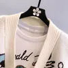 SWEATER Płaszcz Designer T Shirt Kurtka Kurtka 2 -częściowa kreskówka Jacquard Sweater Kurtka luźna zewnętrzna zużycie wszechstronna dzianinowa kropka Toszula