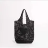 Tygväska designer väska stråpåse strandpåse mode mesh ihålig vävd för sommar halm väska svart aprikos sommarvävd väska semester väska stor kapacitet shopping väska 360