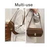 Tas eenvoudige stijl damesontwerper stokbrood schoudertassen 2024 elegante pu lederen trend massieve kleur handtas oksel