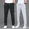 Pantalones de hombres seda de hielo informal suelta delgada recta recta lánguido para combatir pantalones deportivos que combinan