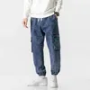 Streting da jogger da uomo da uomo più dimensioni da uomo hip hop streetwear multipli tasche allungate pantaloni in denim in cotone pantaloni larghi 8xl 240424