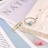 Cluster anneaux 24 km en argent plaqué or ajusté pour les femmes exquise luxe minuscule cz en cristal engagement de mariage bijoux de bijoux