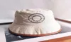 مصممي الأزياء رسالة دلو قبعة للرجال للسيدات قبعات قابلة للطي أبيض الصياد الشاطئ شماس القبعات واسعة الحافة القبعات القابلة للطي السيدات bo4880076
