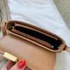 Tas eenvoudige stijl damesontwerper stokbrood schoudertassen 2024 elegante pu lederen trend massieve kleur handtas oksel