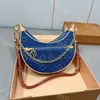 Yüksek kaliteli kadınlar lüks tasarımcı kot bezelye çantası altı çanta kadın tote omuz çantası zinciri crossbody çanta sofistike şık 26cm