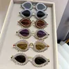 Óculos de sol Designer 2024 Novos óculos de sol pavões personalizados Internet celebridades gato olho de solto de hip hop de óculos de sol Drop gotas y2k copos feminina od2n