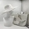 Chapeau et sac Ensemble des design à rayures pour femmes