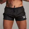 Pantalones cortos para hombres Tabla de playa informal de verano de baño para hombres Policita de cremallera de gimnasio de Surf Fitness