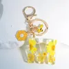 Keychains Exquisite Daisy 26 Letter Sweet Email Bloem Bee Alfabet Keyrings Naam Initiële auto Key Chains Bag Hanger -ornamenten