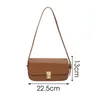 Tas eenvoudige stijl damesontwerper stokbrood schoudertassen 2024 elegante pu lederen trend massieve kleur handtas oksel