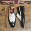Chaussures décontractées printemps noir blanc en cuir pour hommes de haute qualité robe de mariée de créateurs de bobines d'affaires MO-12