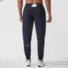 Pantaloni maschili ll uomini abbigliamento da design yoga sport sport rapido dring palestra tasche per pantaloni per pantaloni per pantaloni per la vita elastica casual 1ihk per w dhet1