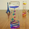 Тайкер -часы двойной цвет масла жидкость плавучих пузырьков на стол.