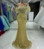 2024 ASO EBI Gold Mermaid Prom Dress Pärled Crystals Sheer Neck Evening Formal Party Second Reception Födelsedagsengagemang Klänningar Klänningar Robe de Soiree ZJ88