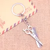 Schlüsselanhänger 20 stücke Mode Keychain 24x53mm Barber Scissor Kamm Stylist Anhänger DIY Männer Schmuck Auto Schlüssel Kette Souvenir für Geschenk