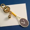 Designer für Männer Frauen Modemody Tennisschläger Schlüsselbundwagen Keychains Edelstahl Schlüsselkette Taschen Anhänger Liebes Geschenk