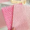 Sacs de rangement 10pcs Rose Love Bubble Sac d'emballage Enveloppe rembourrée Mignon Classique Business Mailing Bijoux imperméables