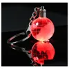 Party Favor Clignotant Porte-clés Party Favor LED Glowing Mini Verre Boule De Terre Pendentif Porte-clés Créatif Illuminé Club De Sport De Vacances Gi Dhkga