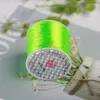 Pietre preziose sciolte 1 rotolo / 35M 0.5mm Filo elastico Cord String Rotondo Linea di cristallo Nylon Gomma elastica per creazione di gioielli Accessori per bordare