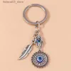 Nyckelringar Lanyards 1PC Böhmen Evil Eye Hamsa Hand Nyckelring för kvinnor Män Blue Eye Sun Feather Key Ring Bag Pendant Car Key Holder Rings Wholesale Q240201