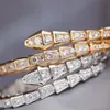 Designer Lin Zhou Full Diamond Snake Bone Armband 18K Guldpläterad Spring Bald Head och Tail Diamond Open Armband Fashionabla och Trendy Wedding Present