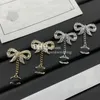 Designer-Ohrstecker mit niedlichem Bogen und Knoten, doppelter Buchstabe, Diamant-Ohrring, luxuriöser, schicker Retro-Ohrstecker, Party-Geschenk mit Box