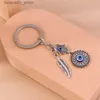 Nyckelringar Lanyards 1PC Böhmen Evil Eye Hamsa Hand Nyckelring för kvinnor Män Blue Eye Sun Feather Key Ring Bag Pendant Car Key Holder Rings Wholesale Q240201