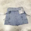 Kjolar våren och sommaren nya sexiga heta flickor arbetar denim stretch miniskirt fick mager skinkor denim kjol kvinnor bälte yq240201