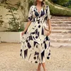 Feestjurken Vestido Modieuze Street Style Damesjurk 2024 Zomer Elegant Sexy V-hals Bloemenprint Lantaarnmouwen Lange pasvorm XL