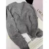 Damenstrick Kimotimo Grauer Schleifenpullover 2024 Herbst Winter Frauen Temperament Hochwertiger, weicher, klebriger Mohair-Strickjacke Duftender Mantel