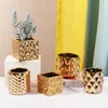 Luxurious gold electroplated ceramic flowerpot embossed geometric art Nordic glazed indoor artificial flowers on the desktop 240127