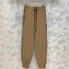 Pantalones de dos piezas para mujer Diseñador Chaqueta de diseñador para mujer Ropa de abrigo con capucha Moda Color sólido Chaquetas rompevientos para mujer Casual Abrigo largo para mujer Ropa Tamaño S-L OE