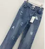 Luksusowe kobiety dżinsy designerskie spodnie y2k moda splicowane dżinsowe spodnie CC list haftowy graficzne spodnie dżinsowe