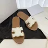 Designer sandal kvinna triom phe mules tofflor flip flops man cowhide läder sandales utomhus strand glider lyxsko brun gummi sula platt häl tazz tozzlist gåva